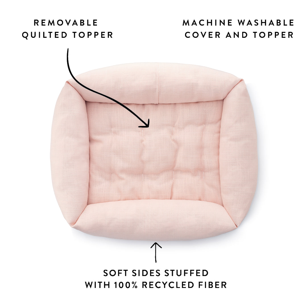 Blush Pink Bolster Dog Bed from The Foggy Dog