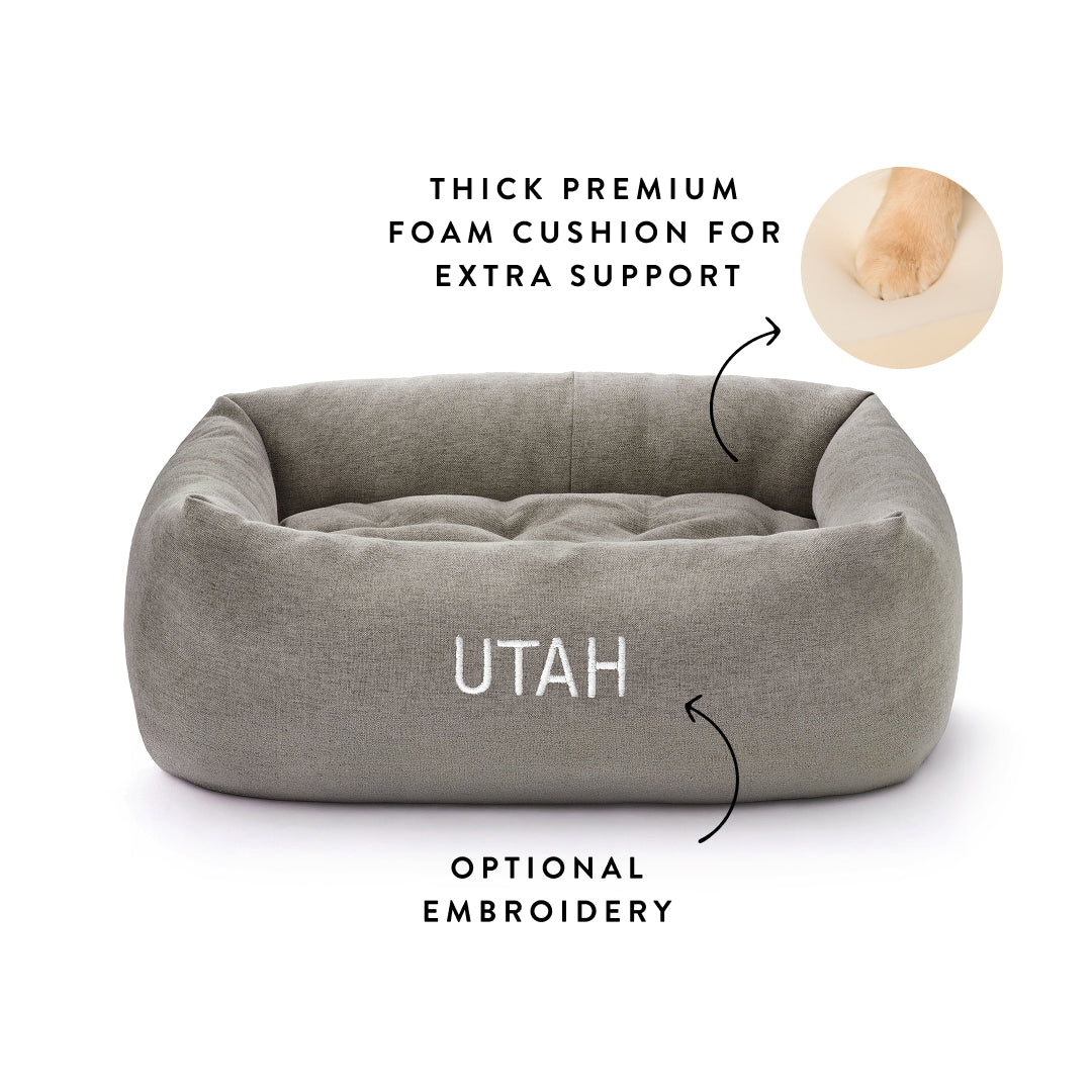 Pebble Gray Flannel Bolster Bed from The Foggy Dog