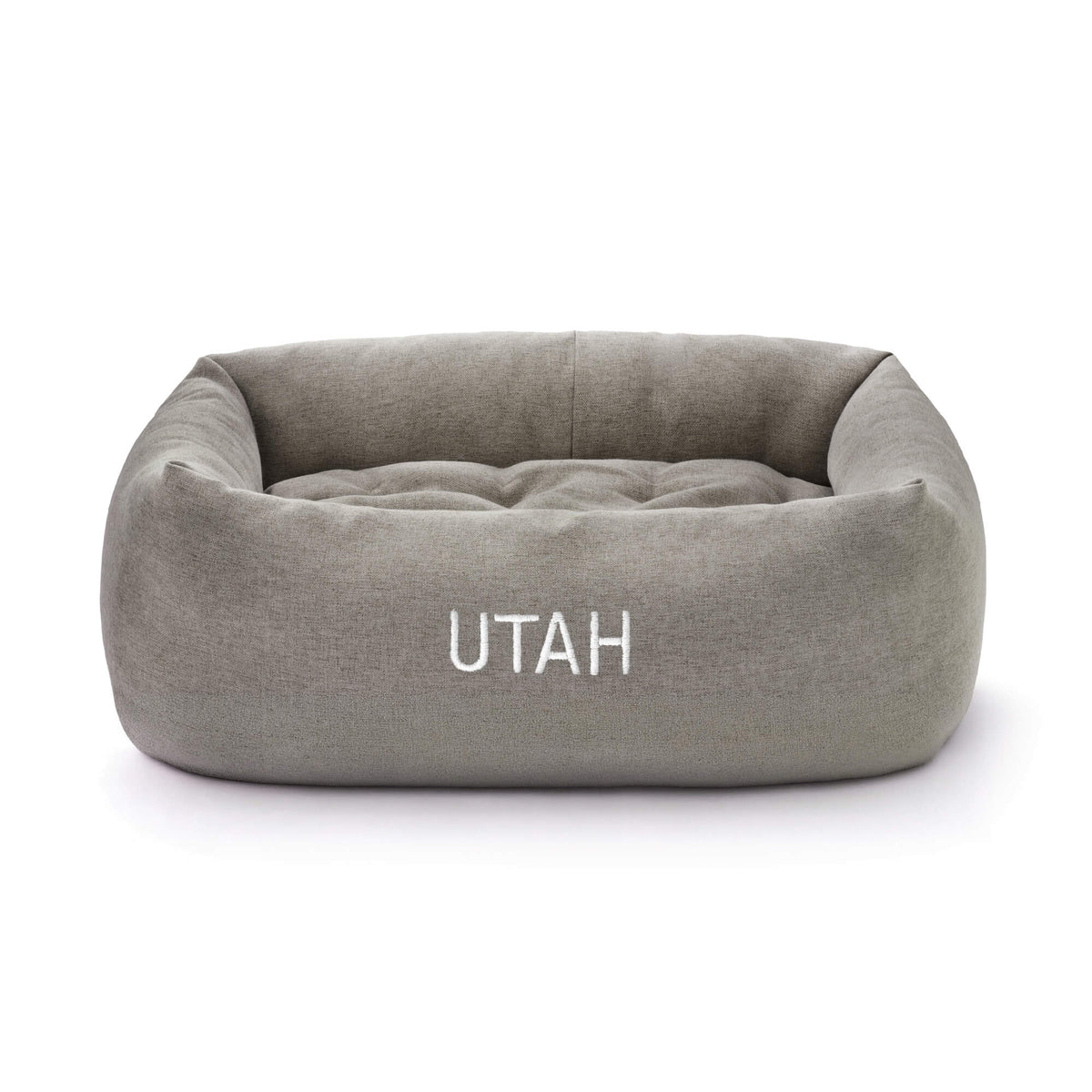 Pebble Gray Flannel Bolster Bed from The Foggy Dog